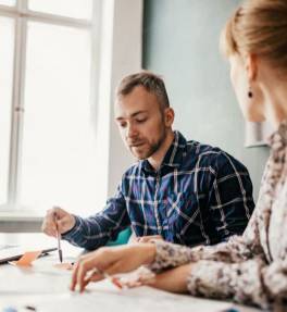 Team managing sudden staff shortages with support from temporary staffing professionals to prevent employee burnout